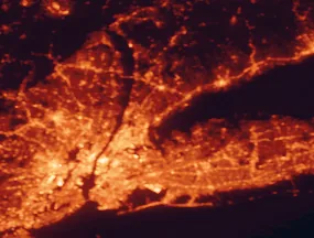 Satellite night-light map of the 50 km around New Rochelle, with New York City, The Bronx and Brooklyn marked