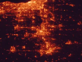 Satellite night-light map of the 50 km around Akron, with Cleveland, Cuyahoga Falls and Stow marked