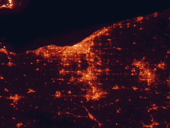 Satellite night-light map of the 100 km around Cuyahoga Valley National Park, with Cleveland, Akron and Parma marked