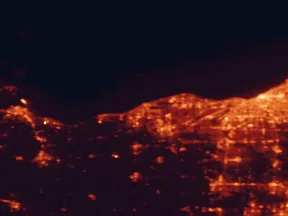 Satellite night-light map of the 50 km around Lorain, with Cleveland, Elyria and Parma marked