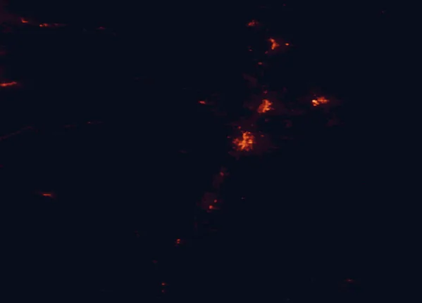 Satellite night-light map of the 100 km around Deschutes National Forest, with Bend, Redmond and Prineville marked