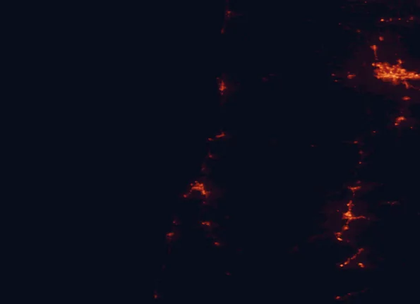 Satellite night-light map of the 100 km around William M. Tugman State Park, with Eugene, Springfield and Coos Bay marked