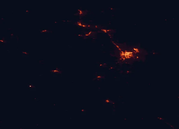 Satellite night-light map of the 100 km around Black Hills National Forest, with Rapid City, Spearfish and Box Elder marked
