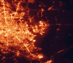 Satellite night-light map of the 50 km around Baytown, with Houston, Pasadena and League City marked