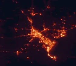 Satellite night-light map of the 50 km around Beaumont, with Port Arthur, Nederland and Vidor marked