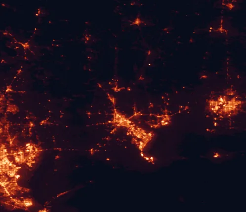 Satellite night-light map of the 100 km around Big Thicket National Preserve, with Beaumont, Port Arthur and Lake Charles marked