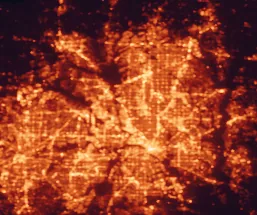Satellite night-light map of the 50 km around Carrollton, with Dallas, Fort Worth and Plano marked
