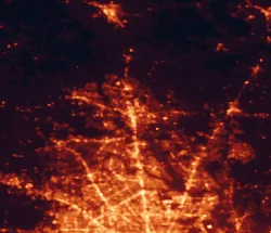 Satellite night-light map of the 50 km around Conroe, with Cypress, The Woodlands and Spring marked