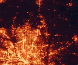 Satellite night-light map of the 50 km around McKinney, with Dallas, Plano and Garland marked