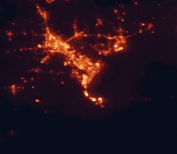Satellite night-light map of the 50 km around Port Arthur, with Beaumont, Groves and Nederland marked