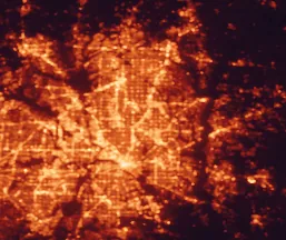 Satellite night-light map of the 50 km around Richardson, with Dallas, Plano and Garland marked