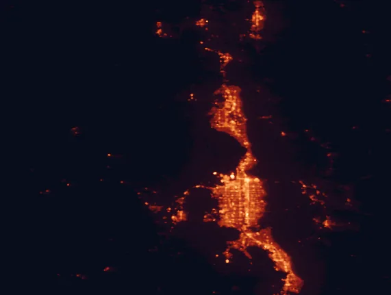 Satellite night-light map of the 100 km around Antelope Island State Park, with Salt Lake City, West Valley City and Layton marked