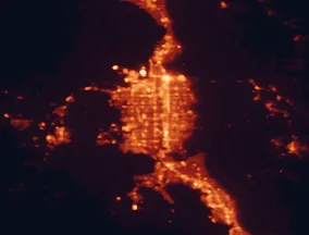 Satellite night-light map of the 50 km around West Jordan, with Salt Lake City, West Valley City and Sandy marked