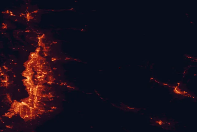 Satellite night-light map of the 100 km around Mount Baker-Snoqualmie National Forest, with Seattle, Tacoma and Bellevue marked