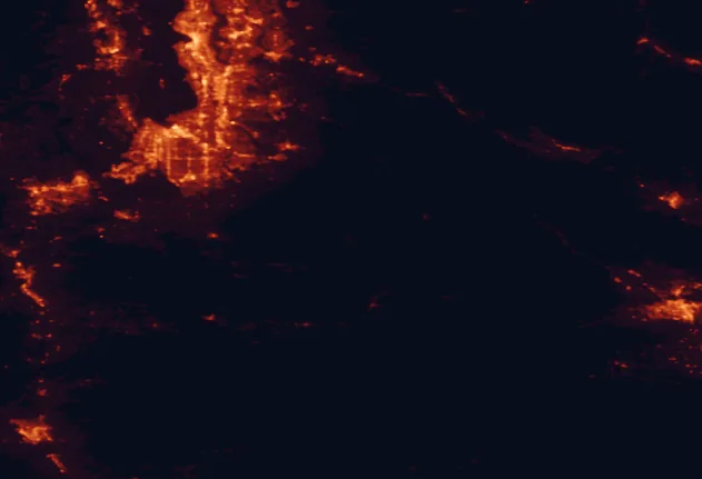 Satellite night-light map of the 100 km around Mount Rainier National Park, with Seattle, Tacoma and Kent marked