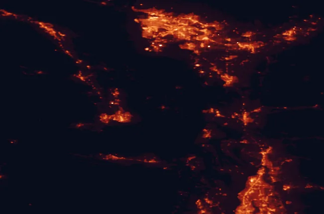 Satellite night-light map of the 100 km around San Juan Islands National Monument, with Surrey, Vancouver and Victoria marked