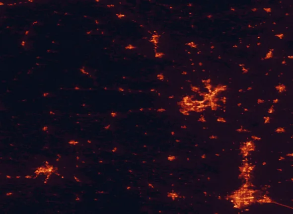 Satellite night-light map of the 100 km around Blue Mound State Park, with Madison, Rockford and Janesville marked