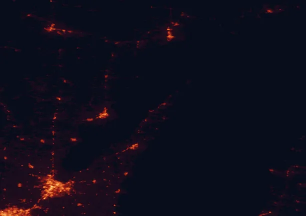 Satellite night-light map of the 100 km around Peninsula State Park, with Green Bay, Marinette and De Pere marked